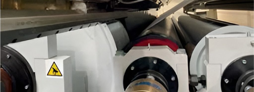 Gruppo laminazione linee estrusione accoppiamento TNT e tessuti